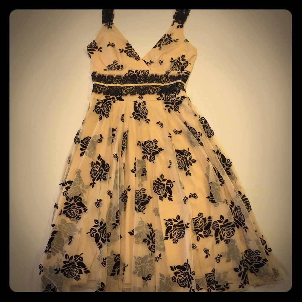 Nude and black cocktail dress